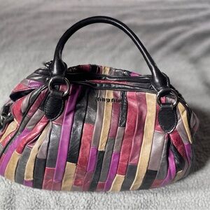 Miu Miu Black and Red Satchel with Artistic Design